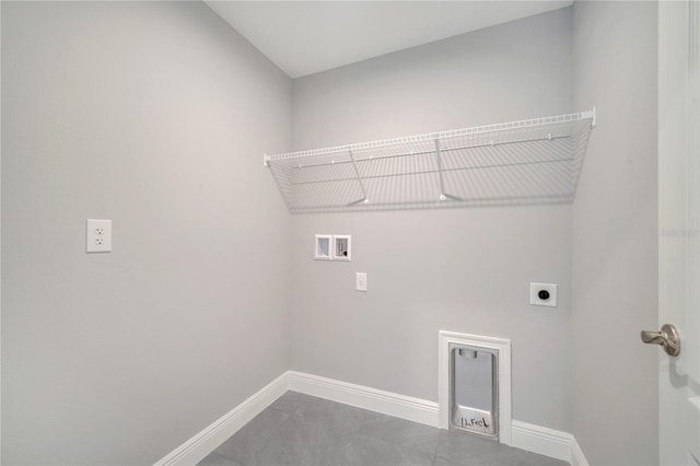 549 Viceroy Ct, Kissimmee, FL 34758 - washroom with electric dryer hookup, washer hookup, and tile patterned floors
