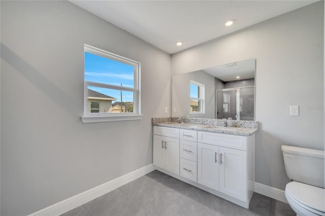 549 Viceroy Ct, Kissimmee, FL 34758 - full bathroom featuring double vanity, a stall shower, and recessed lighting