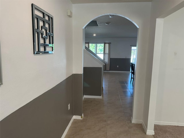 636 Autumn Stream Drive St, Auburndale, FL 33823 - hallway featuring arched walkways and light tile patterned floors