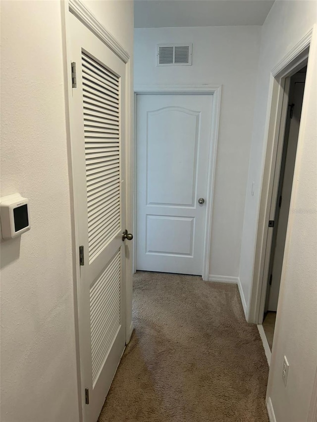 636 Autumn Stream Drive St, Auburndale, FL 33823 - corridor featuring carpet flooring and baseboards