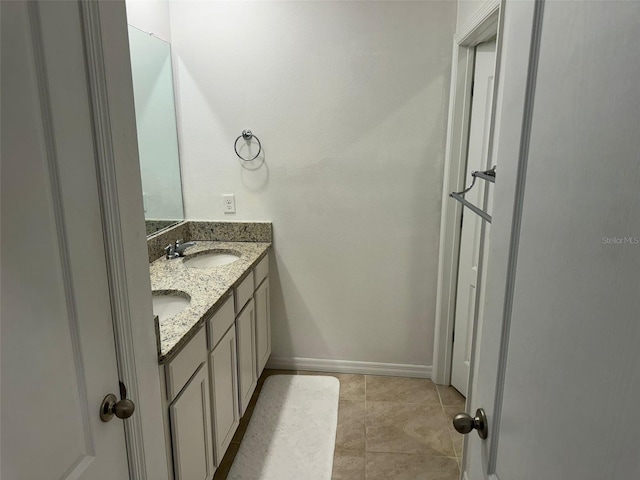 636 Autumn Stream Drive St, Auburndale, FL 33823 - bathroom with double vanity and tile patterned flooring