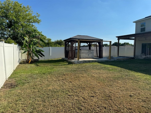 636 Autumn Stream Drive St, Auburndale, FL 33823 - fenced backyard with a gazebo and a patio
