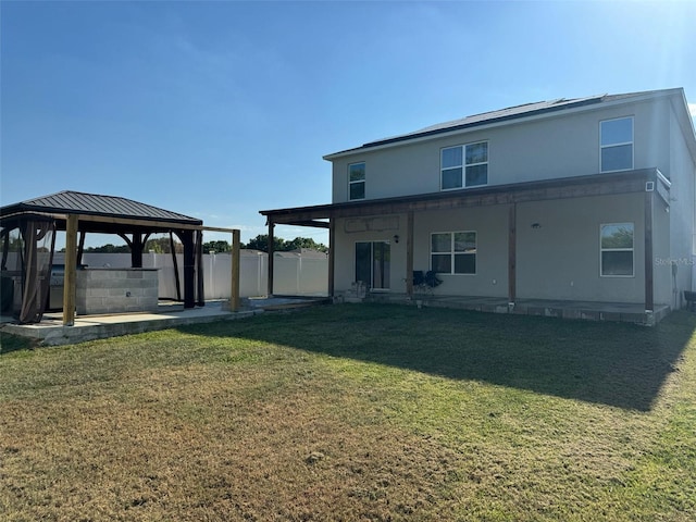 636 Autumn Stream Drive St, Auburndale, FL 33823 - rear view of property with a gazebo, a patio area, and stucco siding