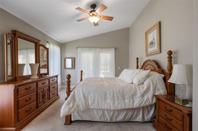 1525 Gants Cir, Kissimmee, FL 34744 - bedroom featuring lofted ceiling, light colored carpet, and a ceiling fan