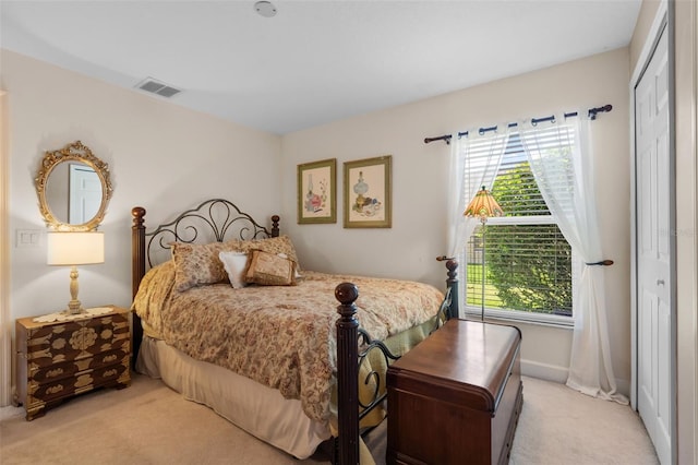 1525 Gants Cir, Kissimmee, FL 34744 - bedroom featuring carpet floors, multiple windows, and a closet