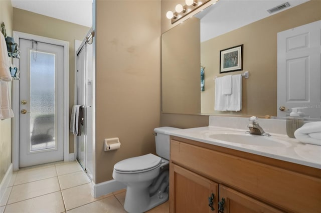 1525 Gants Cir, Kissimmee, FL 34744 - bathroom with vanity, a shower stall, and tile patterned floors