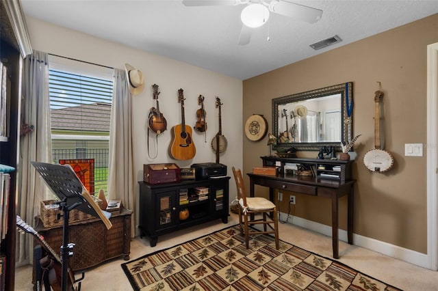 1525 Gants Cir, Kissimmee, FL 34744 - sitting room featuring ceiling fan and light carpet