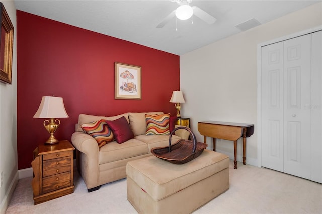 1525 Gants Cir, Kissimmee, FL 34744 - carpeted living room with ceiling fan and baseboards