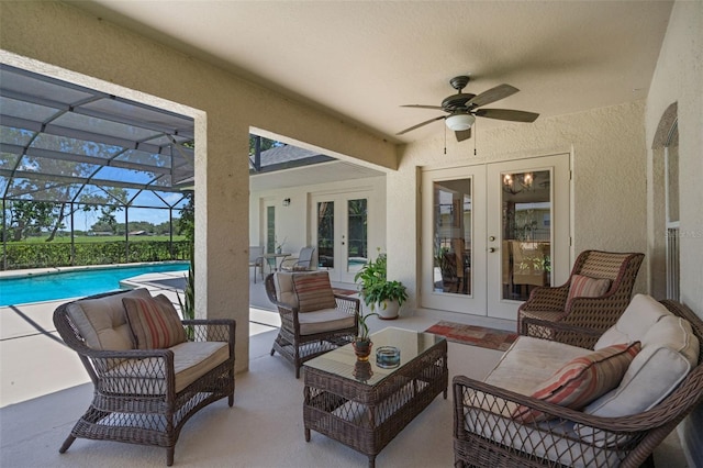 1525 Gants Cir, Kissimmee, FL 34744 - view of patio with french doors, a ceiling fan, an outdoor pool, and an outdoor hangout area