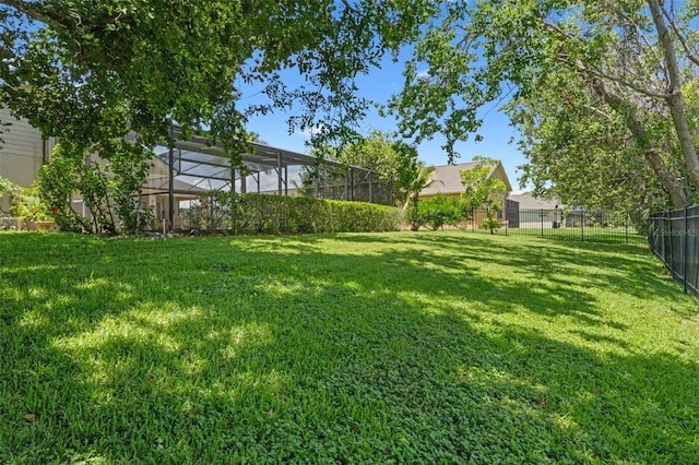 1525 Gants Cir, Kissimmee, FL 34744 - view of yard with a lanai