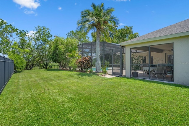 1525 Gants Cir, Kissimmee, FL 34744 - fenced yard with glass enclosure and ceiling fan