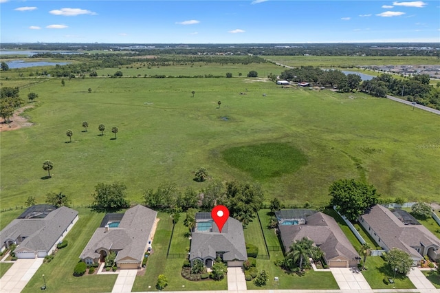 1525 Gants Cir, Kissimmee, FL 34744 - aerial perspective of suburban area with a large body of water