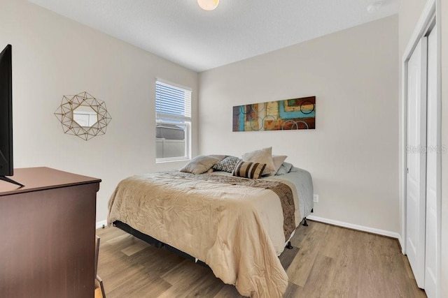 1864 Castleton Dr, Saint Cloud, FL 34771 - bedroom with light wood-style flooring and baseboards