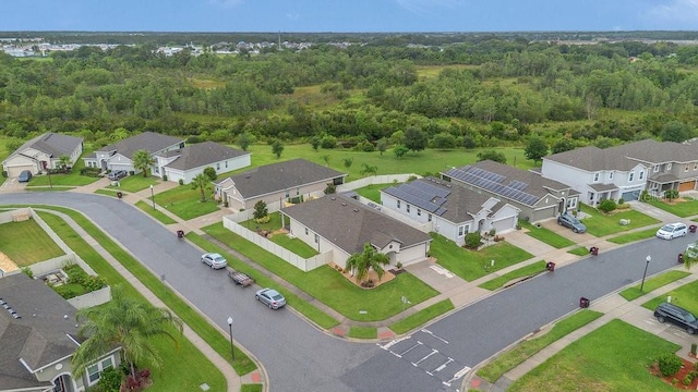 1864 Castleton Dr, Saint Cloud, FL 34771 - aerial view of residential area featuring a heavily wooded area