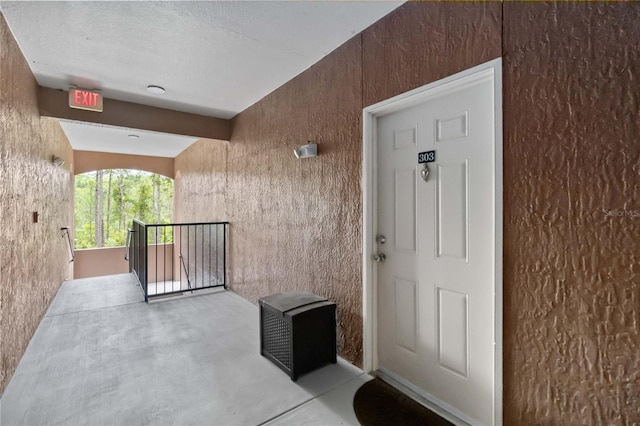 8836 Villa View Cir Unit 303, Orlando, FL 32821 - view of exterior entry featuring stucco siding
