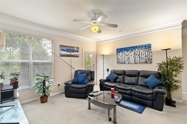 8836 Villa View Cir Unit 303, Orlando, FL 32821 - carpeted living area featuring healthy amount of natural light, a ceiling fan, and crown molding