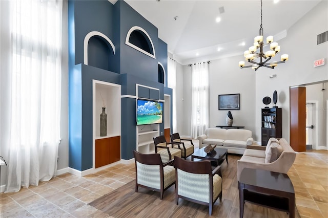 8836 Villa View Cir Unit 303, Orlando, FL 32821 - living room with high vaulted ceiling, a chandelier, and recessed lighting