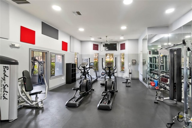 8836 Villa View Cir Unit 303, Orlando, FL 32821 - gym with a ceiling fan and recessed lighting