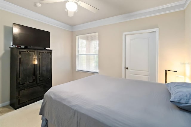 8836 Villa View Cir Unit 303, Orlando, FL 32821 - bedroom with crown molding, light carpet, and ceiling fan