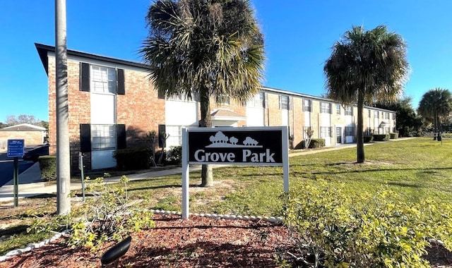 5325 Curry Ford Rd Unit D203, Orlando, FL 32812 - community / neighborhood sign featuring a lawn
