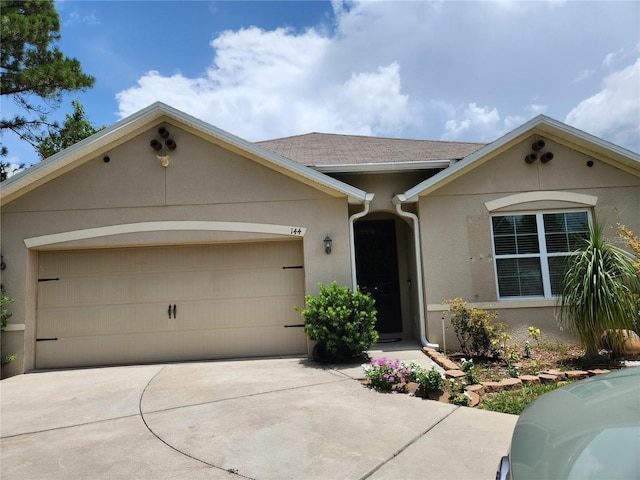144 Hawthorne Way, Davenport, FL 33896 - ranch-style house with stucco siding, a garage, driveway, and a shingled roof