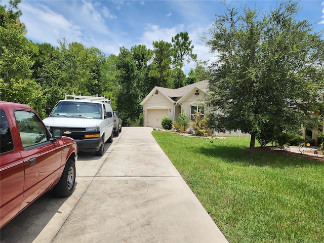 144 Hawthorne Way, Davenport, FL 33896 - view of front of home with concrete driveway, a front lawn, and a garage
