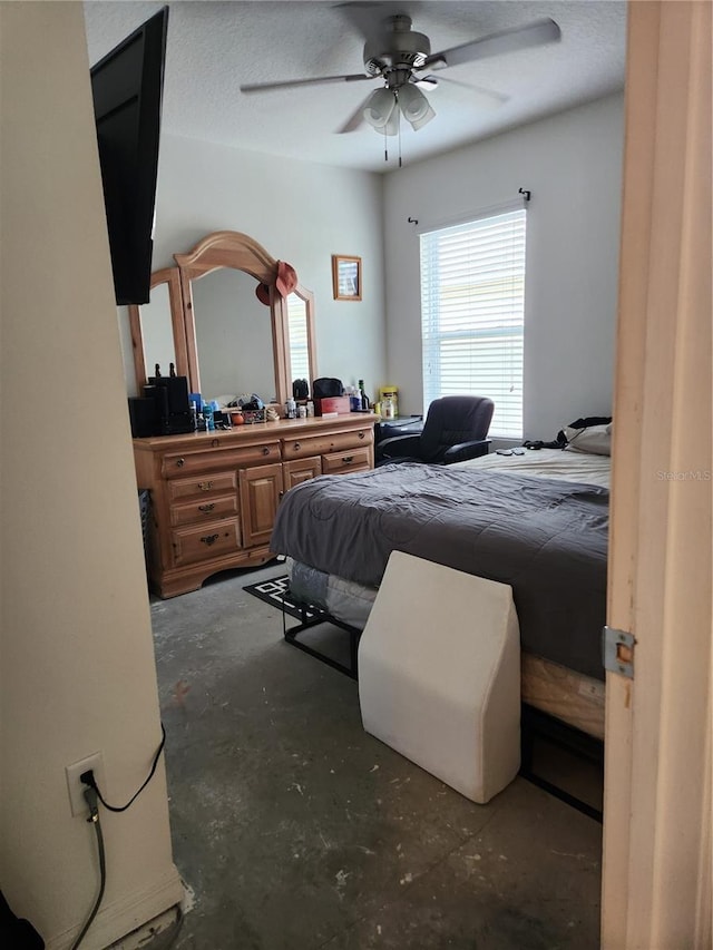 144 Hawthorne Way, Davenport, FL 33896 - bedroom featuring unfinished concrete floors and ceiling fan