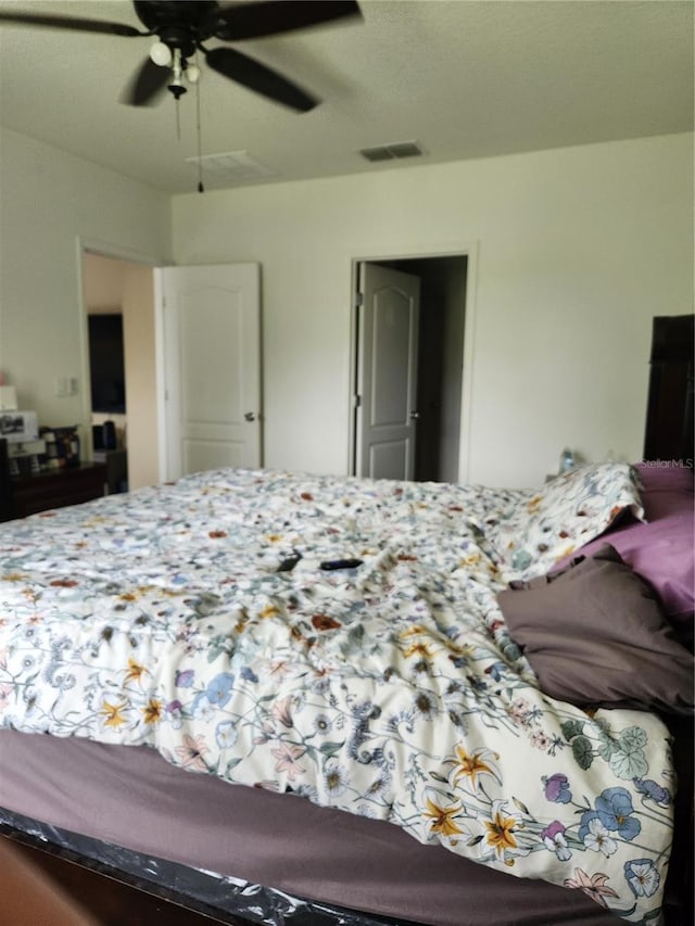144 Hawthorne Way, Davenport, FL 33896 - bedroom with a ceiling fan