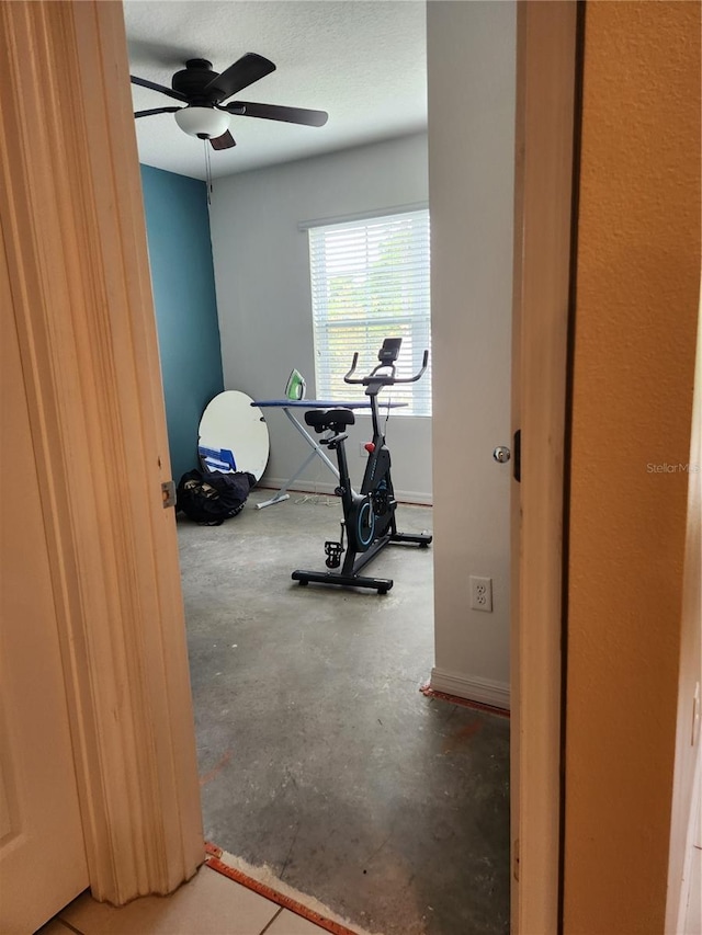 144 Hawthorne Way, Davenport, FL 33896 - workout room featuring ceiling fan and baseboards