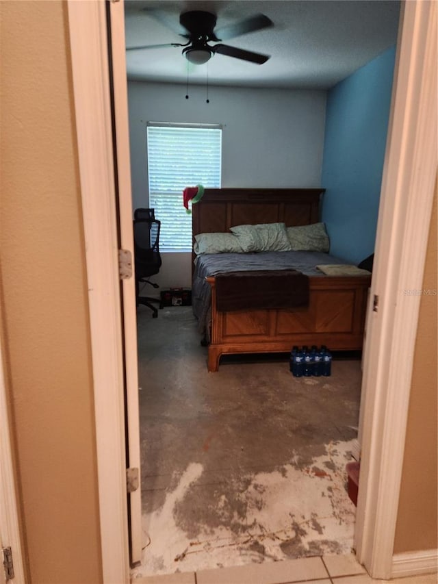 144 Hawthorne Way, Davenport, FL 33896 - bedroom with unfinished concrete flooring and ceiling fan
