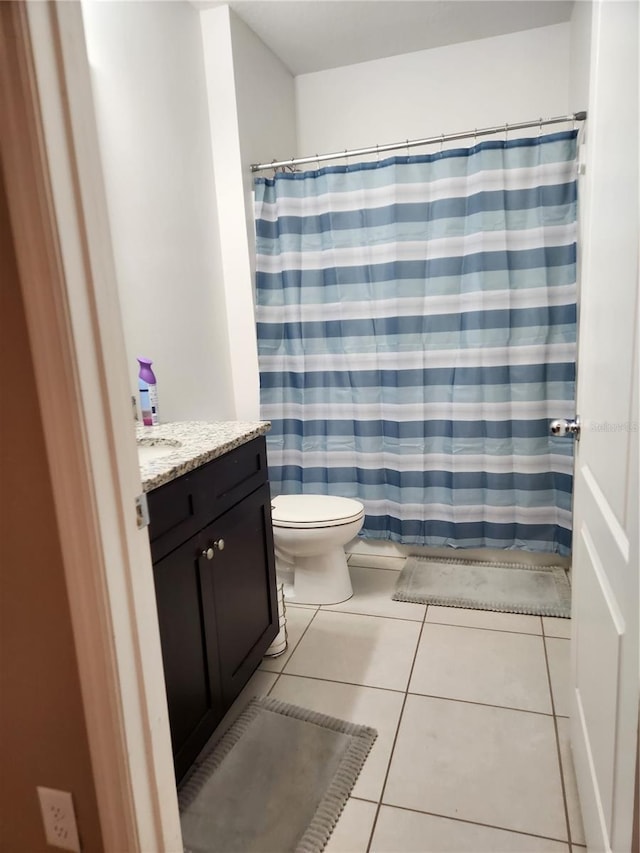 144 Hawthorne Way, Davenport, FL 33896 - full bath with vanity, tile patterned flooring, and a shower with curtain