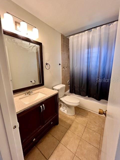 812 10th St, Saint Cloud, FL 34769 - full bathroom featuring tile patterned floors, vanity, and shower / bathtub combination with curtain
