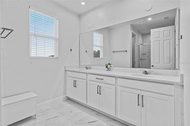 3252 Jackson Bluff Way, Clermont, FL 34711 - full bath featuring double vanity, marble look tile flooring, a shower stall, and recessed lighting