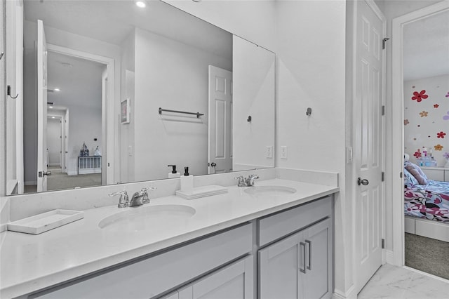 3252 Jackson Bluff Way, Clermont, FL 34711 - ensuite bathroom featuring double vanity and marble finish flooring