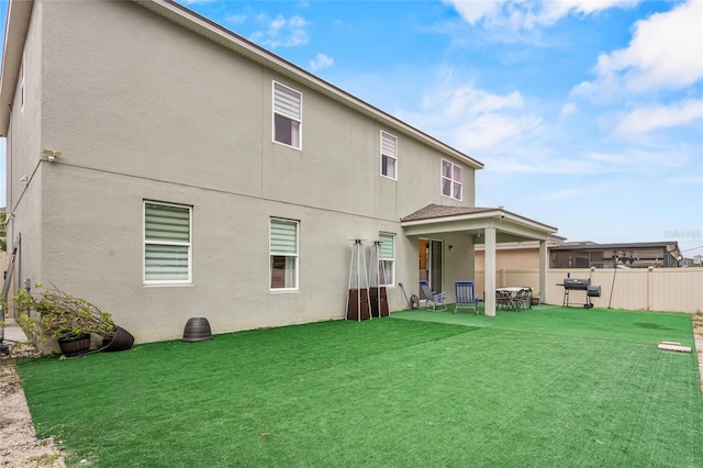 3252 Jackson Bluff Way, Clermont, FL 34711 - back of property featuring stucco siding and a patio