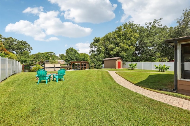 27805 Lois Dr, Tavares, FL 32778 - fenced backyard with a storage unit