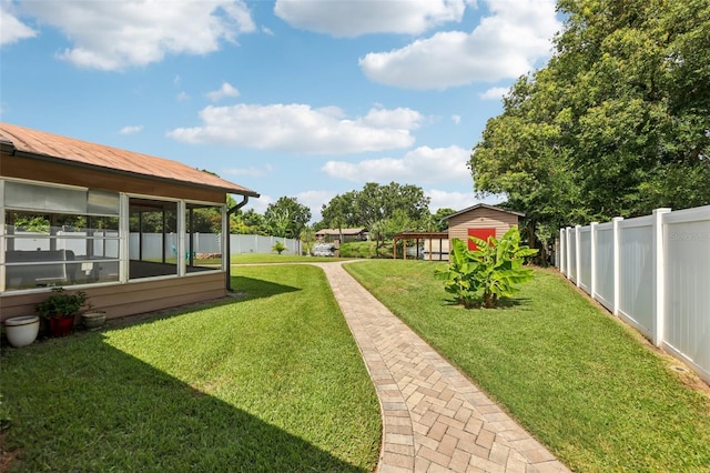 27805 Lois Dr, Tavares, FL 32778 - fenced backyard with a sunroom and a storage unit
