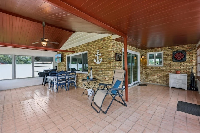 27805 Lois Dr, Tavares, FL 32778 - sunroom featuring a ceiling fan and outdoor dining space