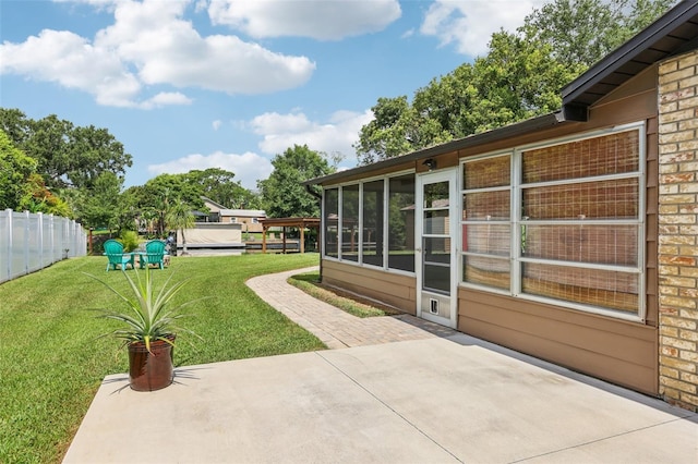 27805 Lois Dr, Tavares, FL 32778 - view of yard with a patio and a sunroom