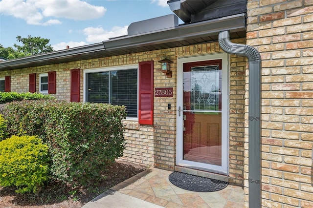 27805 Lois Dr, Tavares, FL 32778 - doorway to property with brick siding