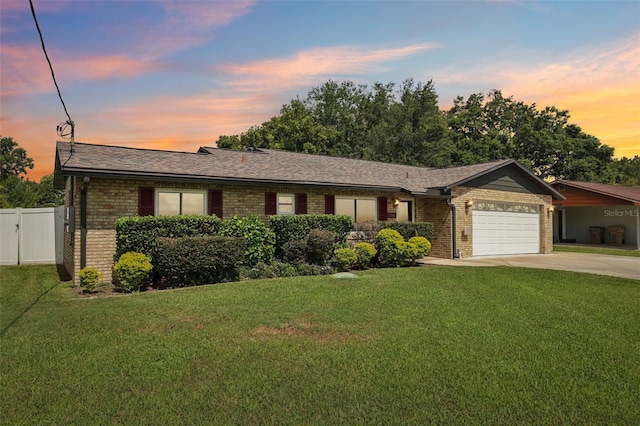 27805 Lois Dr, Tavares, FL 32778 - single story home featuring brick siding, an attached garage, concrete driveway, and roof with shingles