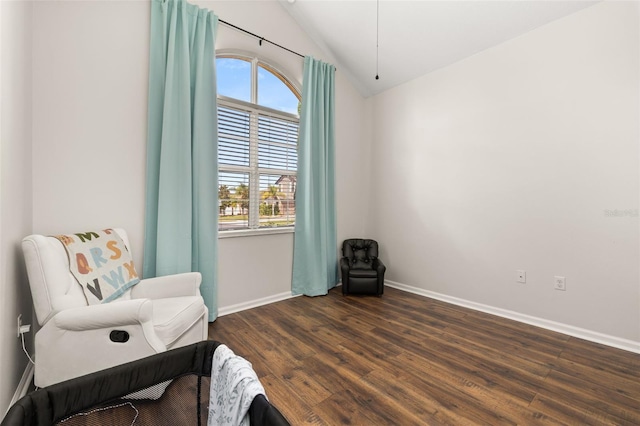 2823 Sail Breeze Way, Kissimmee, FL 34744 - sitting room featuring vaulted ceiling and dark wood-type flooring