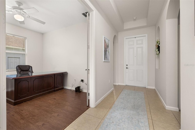 2823 Sail Breeze Way, Kissimmee, FL 34744 - office space with arched walkways, light tile patterned floors, and a ceiling fan