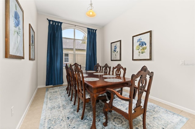 2823 Sail Breeze Way, Kissimmee, FL 34744 - dining space with light tile patterned flooring and baseboards