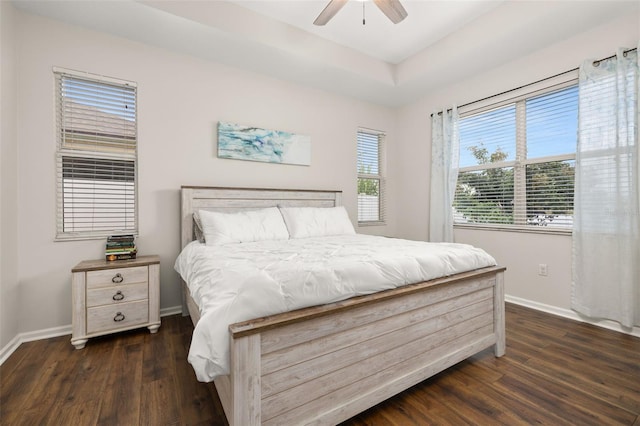 2823 Sail Breeze Way, Kissimmee, FL 34744 - bedroom with dark wood-style flooring and a ceiling fan
