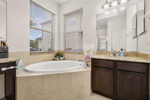 2823 Sail Breeze Way, Kissimmee, FL 34744 - full bath with vanity, a bath, and a shower