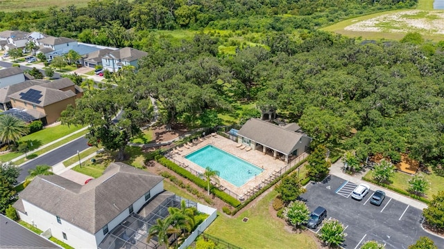 2823 Sail Breeze Way, Kissimmee, FL 34744 - aerial view of a pool area and a heavily wooded area