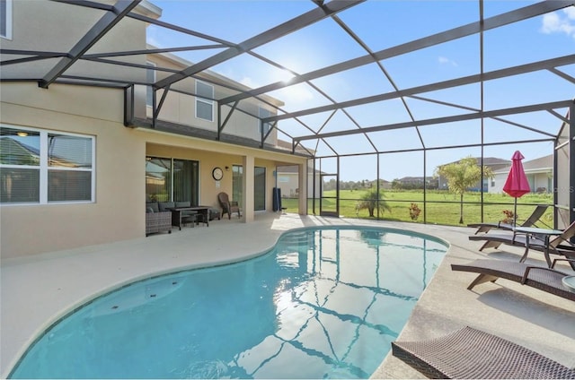 2231 Crofton Springs Ct, Davenport, FL 33837 - swimming pool with a patio area, glass enclosure, and an outdoor hangout area