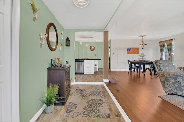 1203 Monterey Dr, Eustis, FL 32726 - foyer with wood finished floors and baseboards