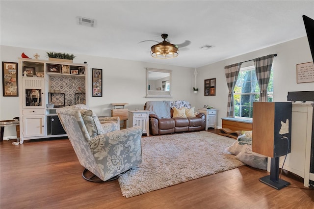 1203 Monterey Dr, Eustis, FL 32726 - living area with dark wood-type flooring and a ceiling fan
